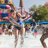 A family playing at the outdoor waterpark at Mt. Olympus Water & Theme Park in Wisconsin Dells.