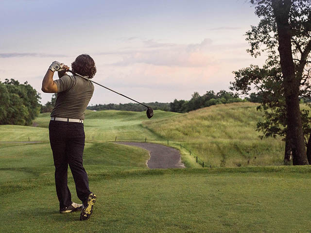 Man golfing at Trappers Turn