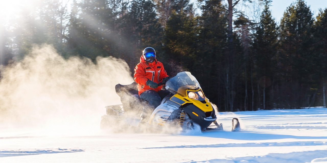 A person snowmobiling.