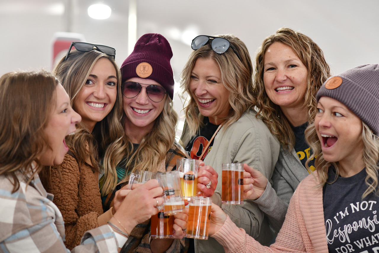 Friends enjoying beers at Dells On Tap.