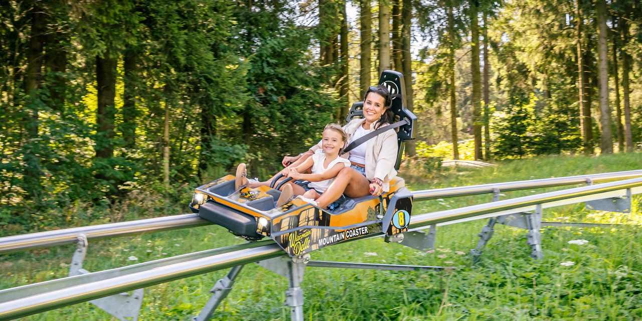 example of mom and daughter on coaster track