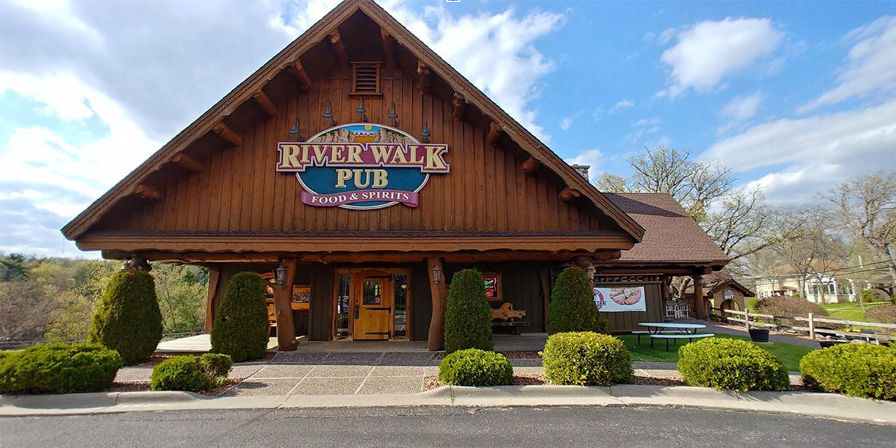 Entrance of large log building.