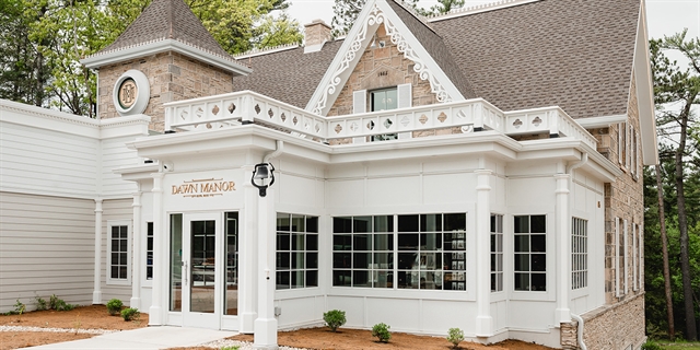 An old brick house style restaurant exterior.