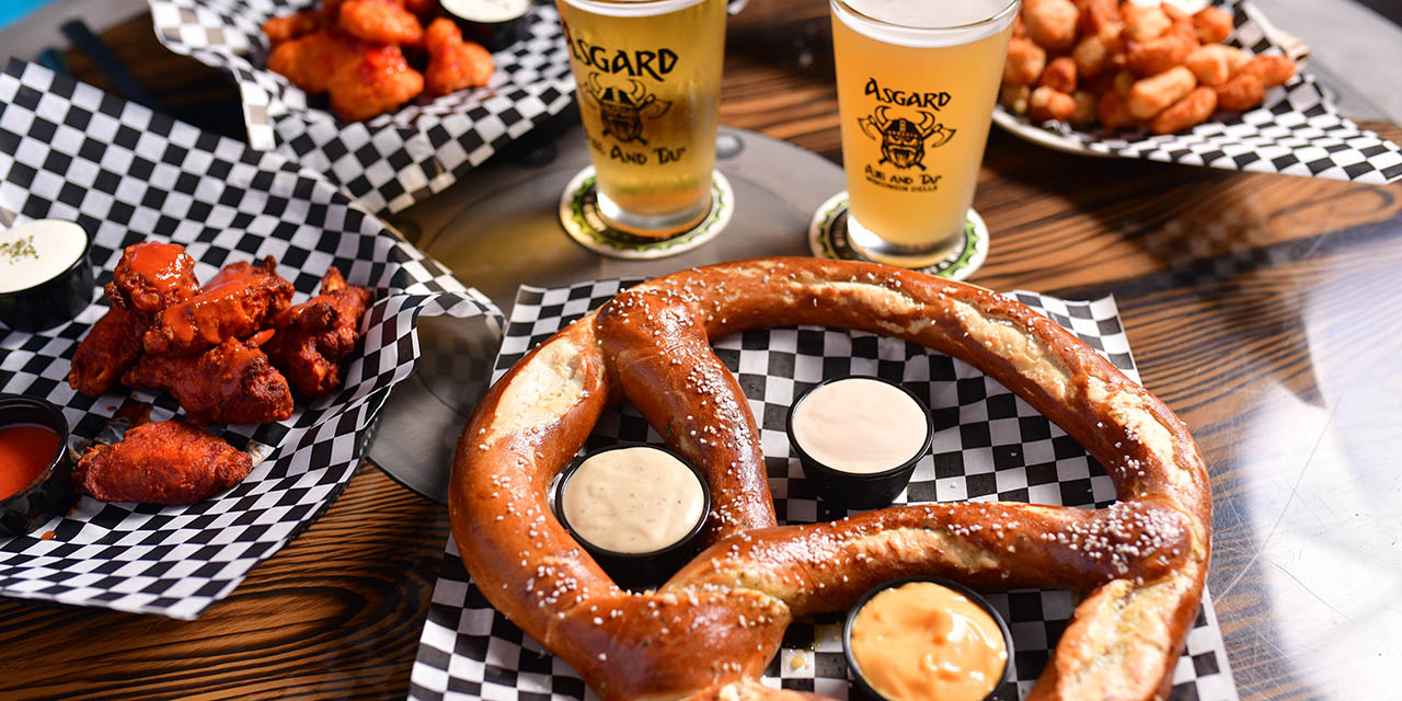 Chicken wings, pretzel and beers.