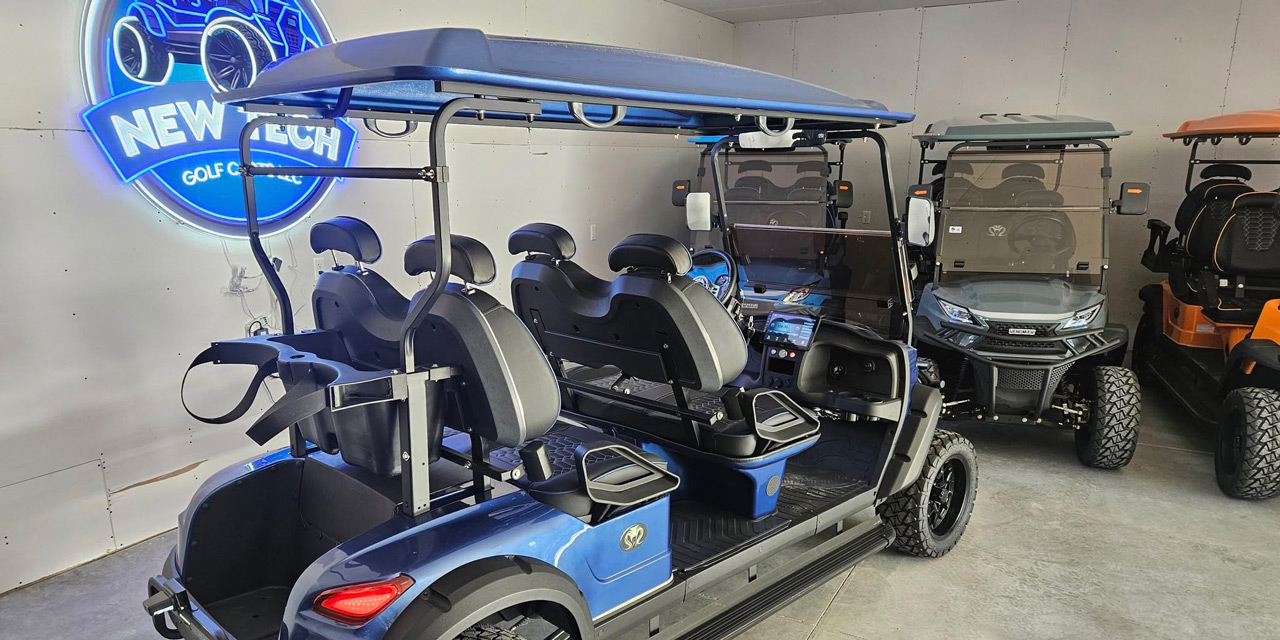 Three golf carts in different colors.